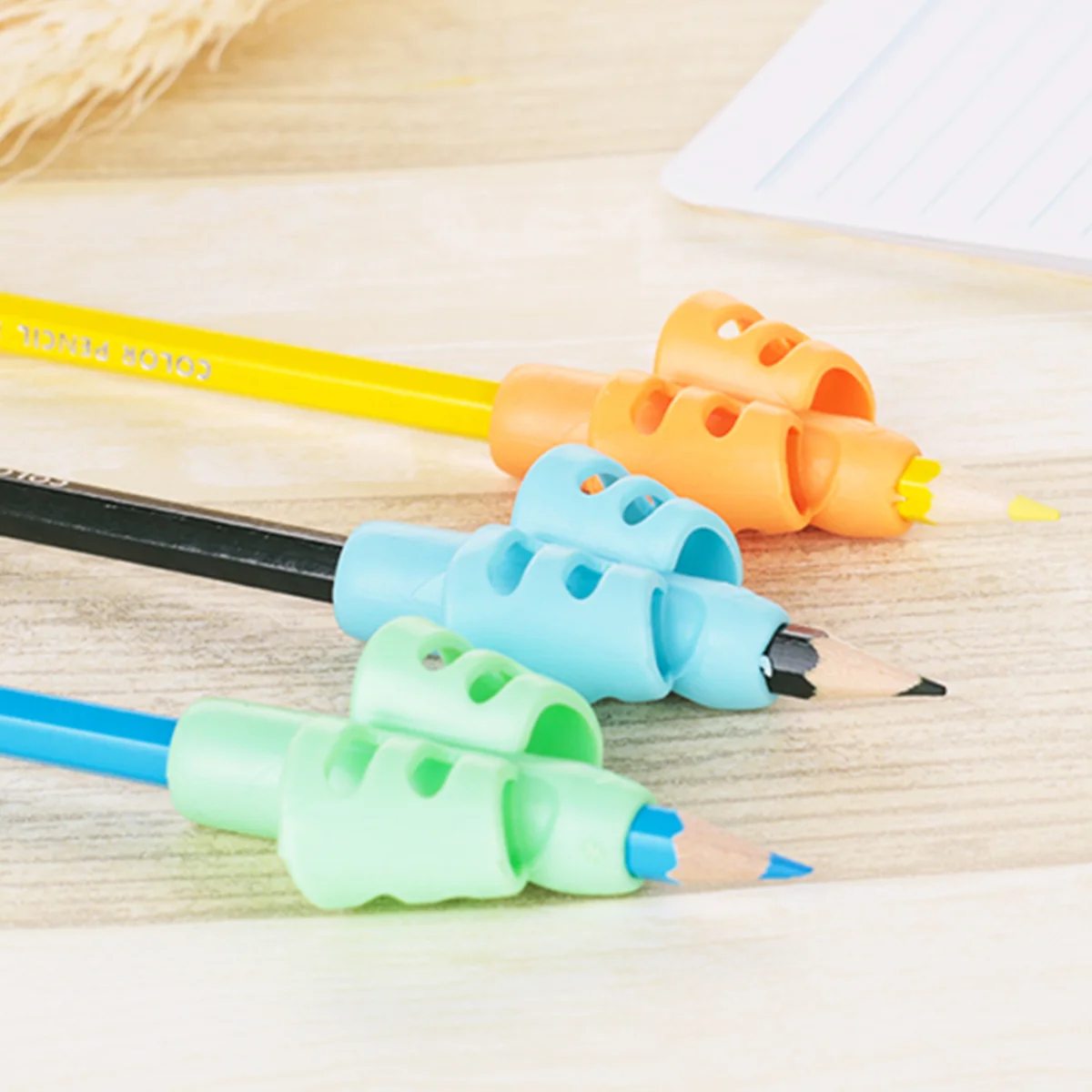 

3pcs Pencil Holder Writing Aid Grip Writing Posture Correction Device for Preschoolers Kindergarten Toddler Kids (Blue, Orange,