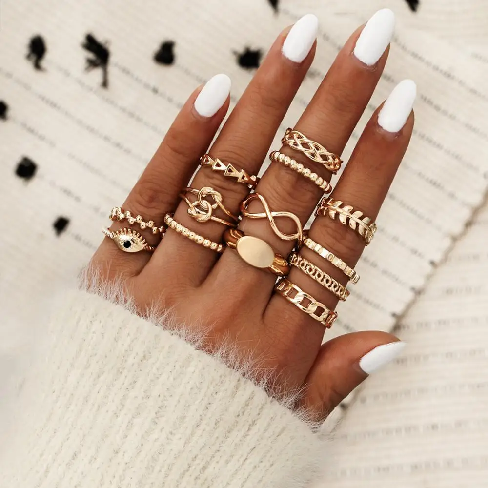 

Fashion New 8 Eyes Demon Eyes Knotted Geometric Leaf Triangle Chain Seal Thirteen Piece Ring Set Joint Ring