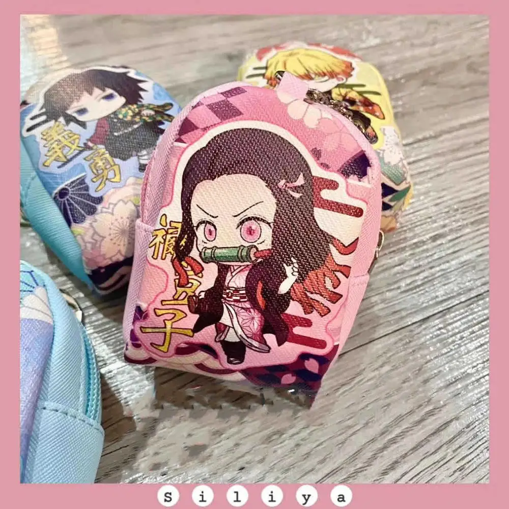 

2020 New Animation Demon Slayer key chain small backpack zero money bag key chain hold a bag PU key chain to store a small bag