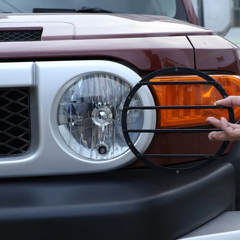

Для Toyota FJ Cruiser 07-21, черная крышка автомобильной фары из нержавеющей стали, хромированная декоративная защитная крышка, наклейка, автомобильн...
