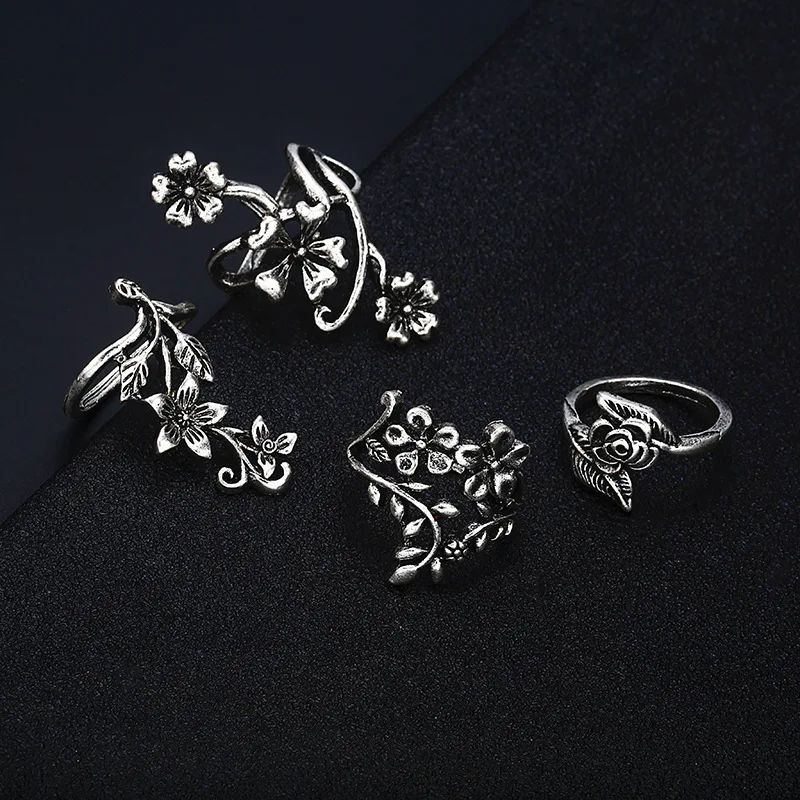 European and American pop fashion personality Ancient silver hollow carved flowers 4 rings set set men and women hand jewelry