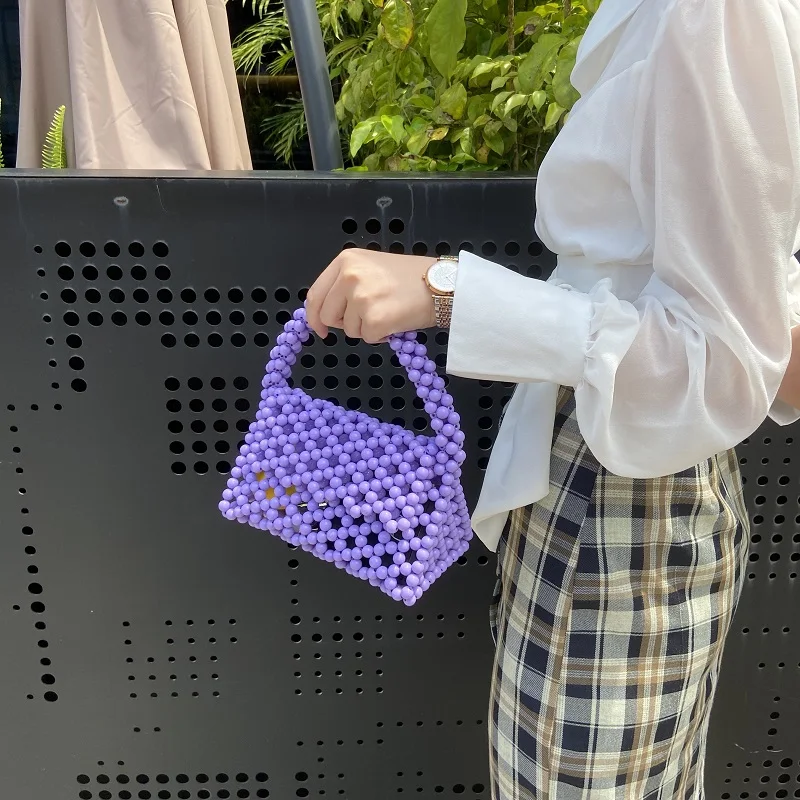 

Versatile triangle bag Beaded armpit bag pearl bag handbag dinner bag leisure fashion trend woven women's bag