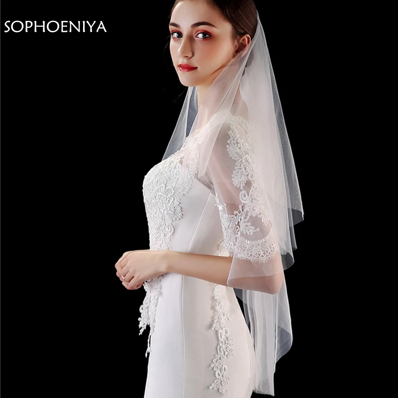 Модная двухслойная короткая свадебная вуаль с вырезами по краям и расческой 2021