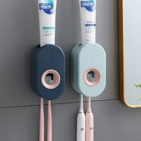 wall mounted toothpaste holder adhesive automatic toothpaste squeezer set toothbrush rack wall suction toothpaste squeezer