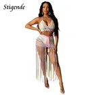 Комплект вязаный женский из двух предметов с бандажной юбкой и кисточками