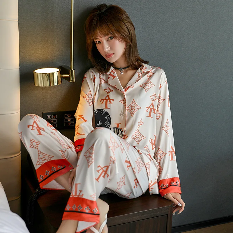 

2021 Spring And Summer New Pajamas Women's Ice Silk Sleepwear Thin Long-sleeved Cardigan Two-piece Cartoon Printed Home Suit