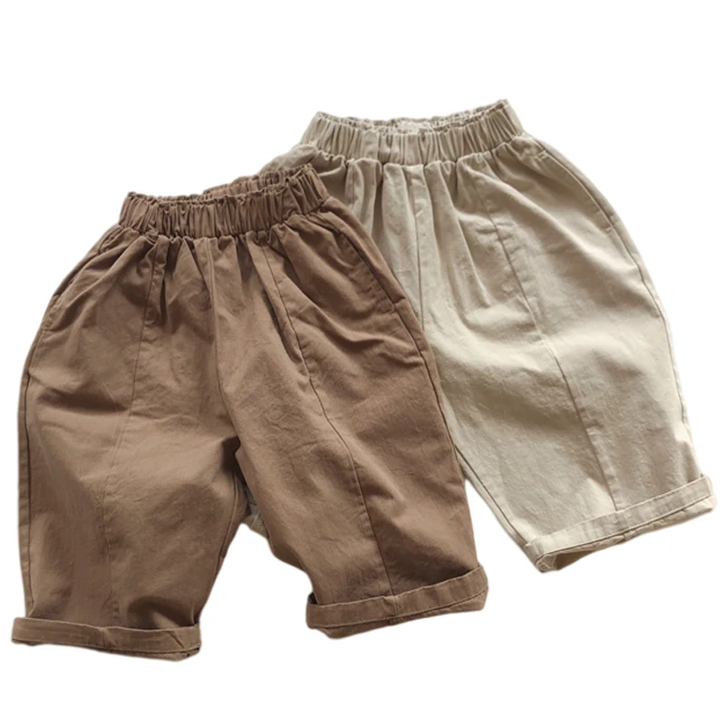 

Модные детские брюки в Корейском стиле, брюки для мальчиков 2022, весенние однотонные широкие повседневные брюки для мальчиков и девочек, хло...