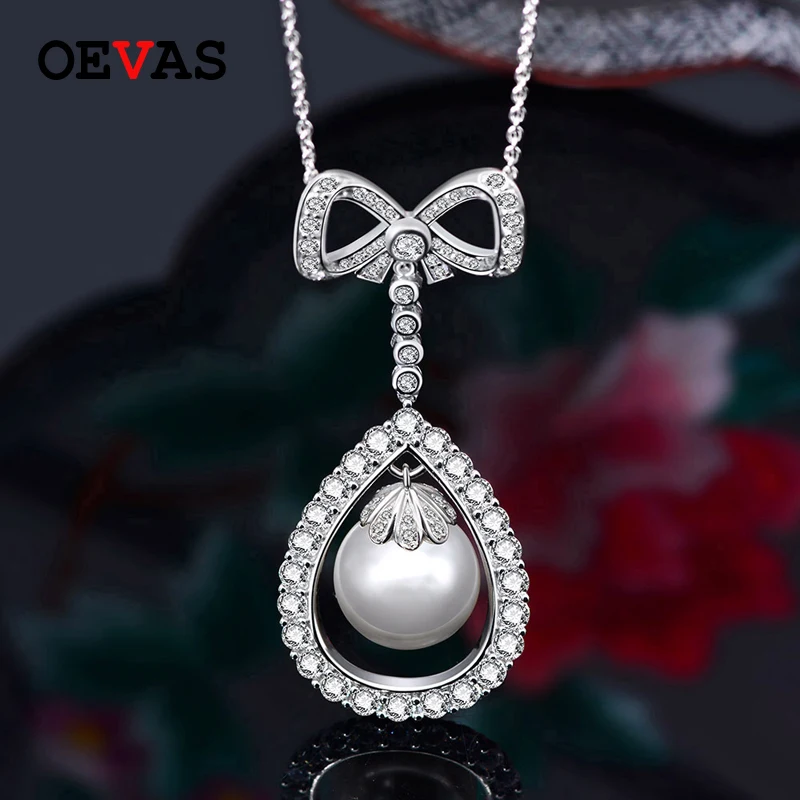

OEVAS 925 Sterling Silver Created Moissanite Freshwater Pearl Gemstone Women Bowknot Pendant Necklace Fine Jewelry Wholesale