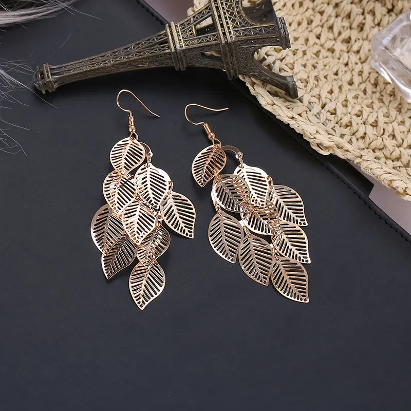 

Fashion Hollow Flower Gold Color Leaf Drop Dangling Earrings pendientes Jewelry Wedding Bridal Tassel Long Earrings for women