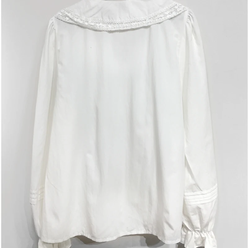 

2021 new spring lace up hollow out shirt elegant fashion termperament solid shirt sweet korean style solid shirt 2021 new tops