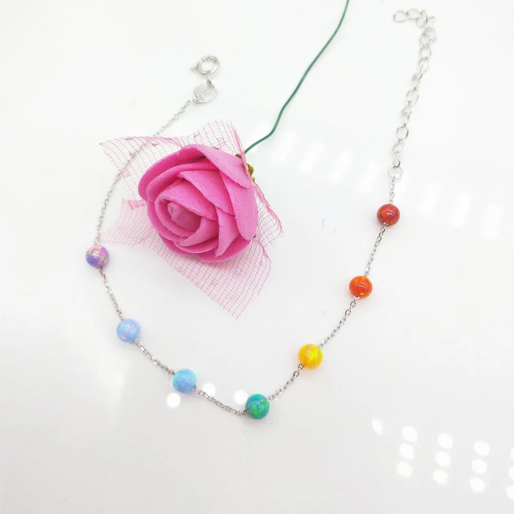 (1 шт/лот) Новый модный браслет с 4 мм опаловыми бусинами в радужных цветах с серебряными вставками 925 с 7 синтетическими круглыми опаловыми шариками. Подарочный браслет.