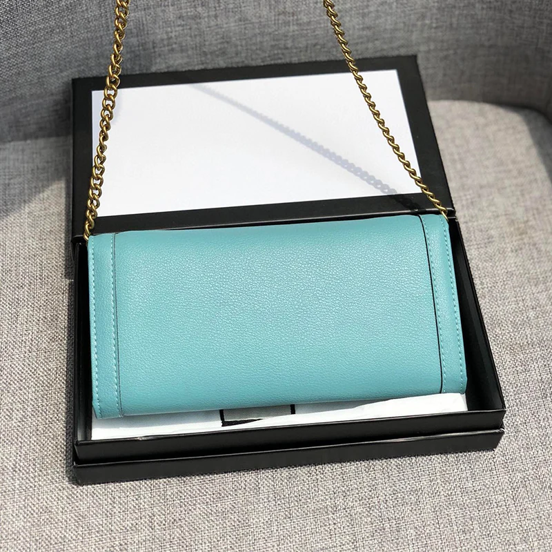 

Vintage designer style contrast color bamboo buckle leather clutch. Fashion shoulder bag, ladies new hardware chain messenger ba