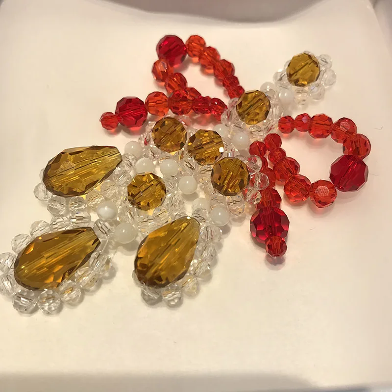 

European and American bowknot crystal tassel earrings hand-woven beads earrings colorful crystal bow tie earrings