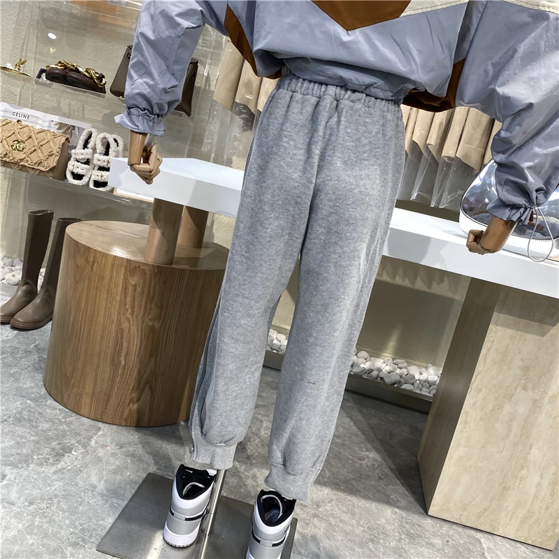 

Niche Design 2021 Fashion Casual Pants Women Loose Waist Loose Side Zipper Slit Pants Versatile Leg Turnip Pants
