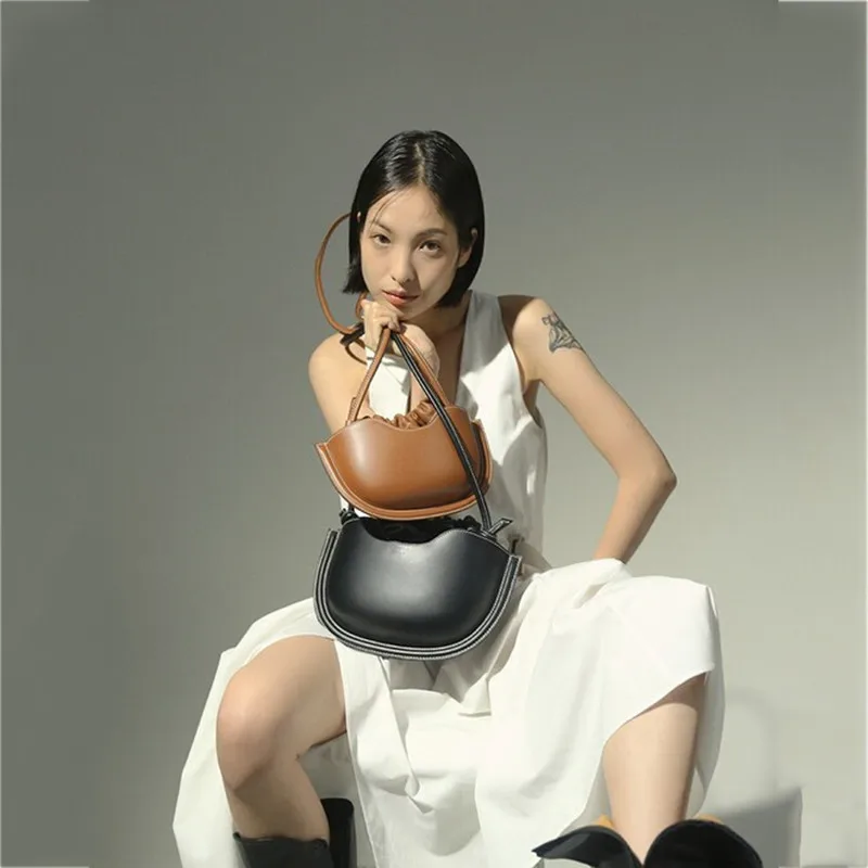 

Premium Texture Niche Drawstring PU Leather Ladies Messenger Bag 2021 Fashion Ladies Messenger Bag Ladies Shoulder Bag