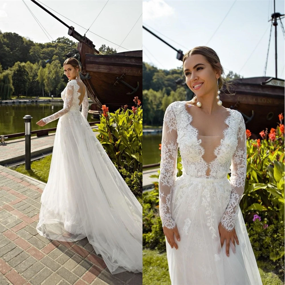 

Новый размера плюс с аппликацией свадебное платье на заказ с v-образным вырезом с длинными рукавами и кружевной отделкой с открытой спиной Т...