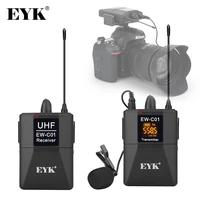 eyk ew c01 30 channels uhf wireless lavalier microphone system with handheld style lapel mic interview for slr camera camcorder