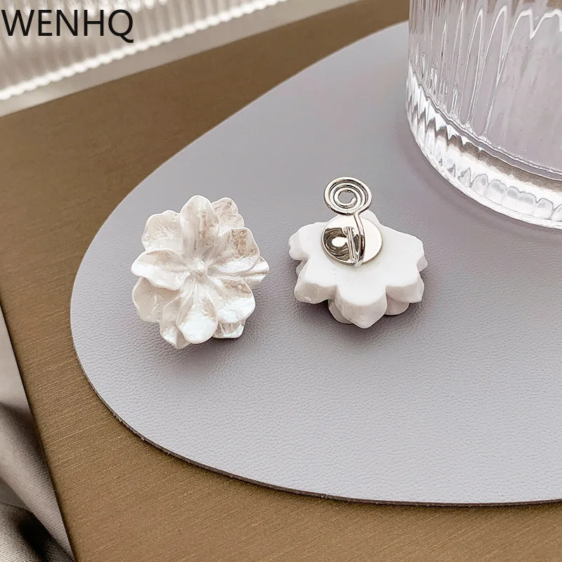 

WENHQ Korean Style White Color Camellia Clip on Earrings No Pierced for Women Girl Party Prom Hot Sale Mosquito Coil Ear Clip