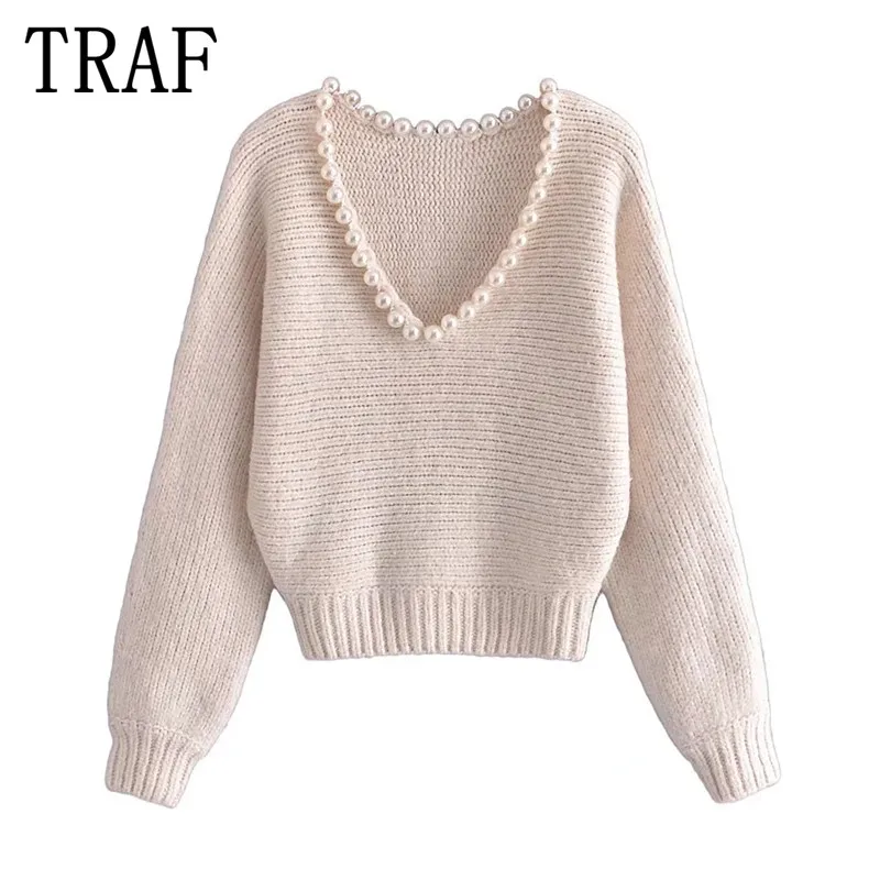 

Женский трикотажный свитер с искусственным жемчугом и V-образным вырезом