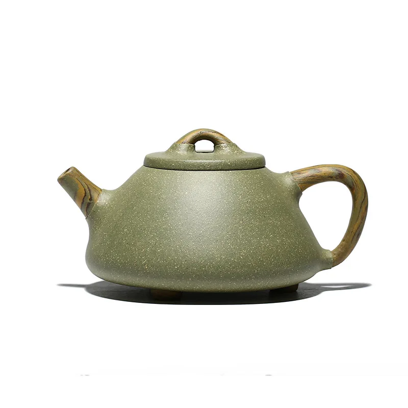 

Purple clay pot, ground clay, stone ladle, raw ore, bean green mud, Kung Fu teapot with sand in the rain