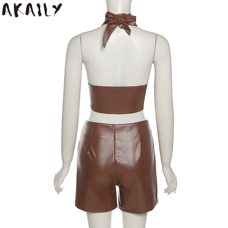 

Akaily Summer Leather PU 2 Two Piece Sets Women Outfits Brown Halter Sleeveless Backless Crop Top Skinny Shorts Sets Female 2021