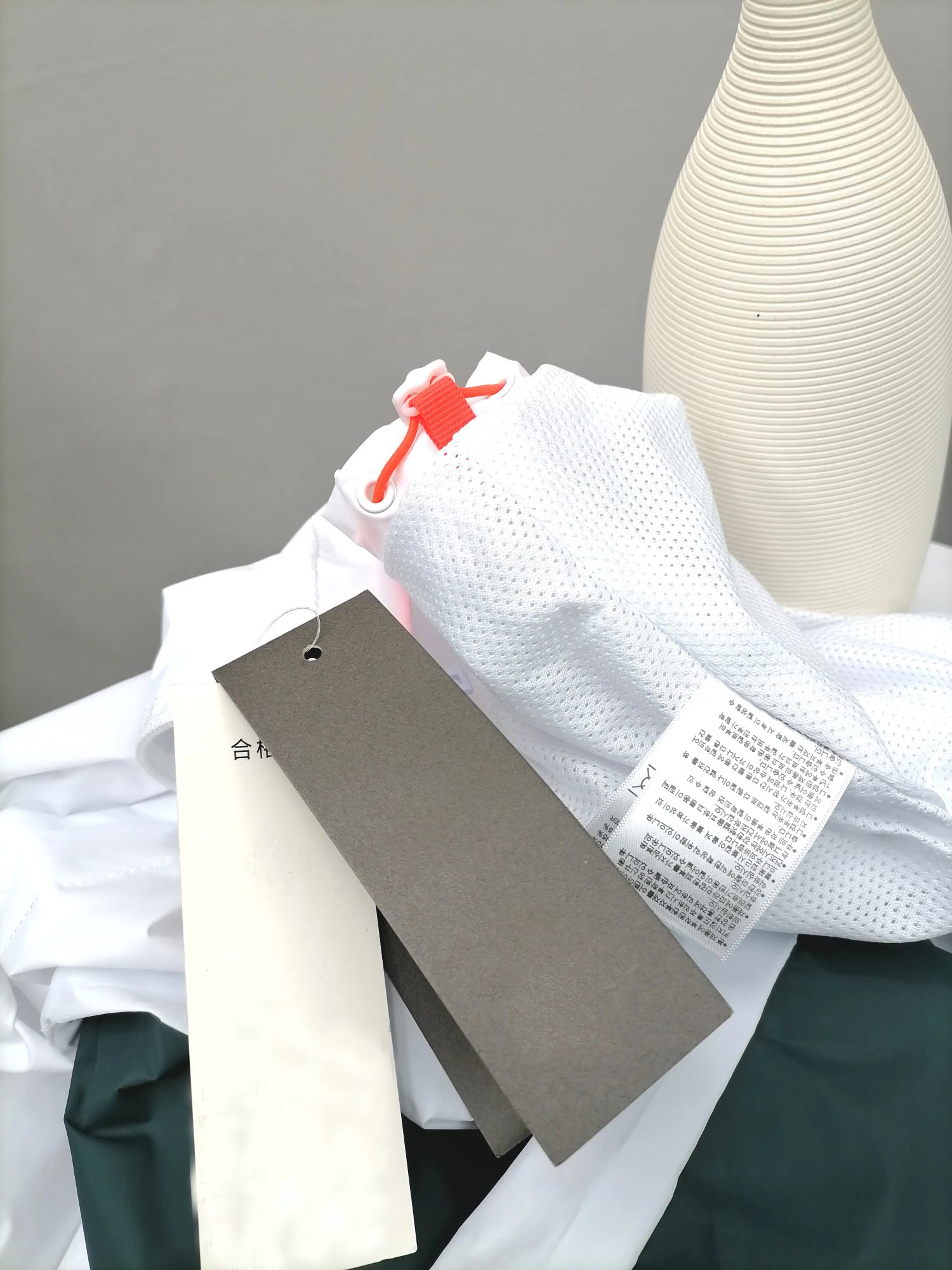 

The latest men and women spring autumn lovers with hat windproof coat mesh lining two-color splicing