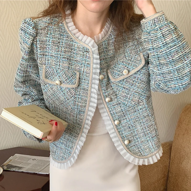

[EWQ] Korea Chic Round Neck Crimped Wood Fungus Stitched Double Pocket Pearl Button Loose Bubble Sleeve Coat Female 2021 16E4130