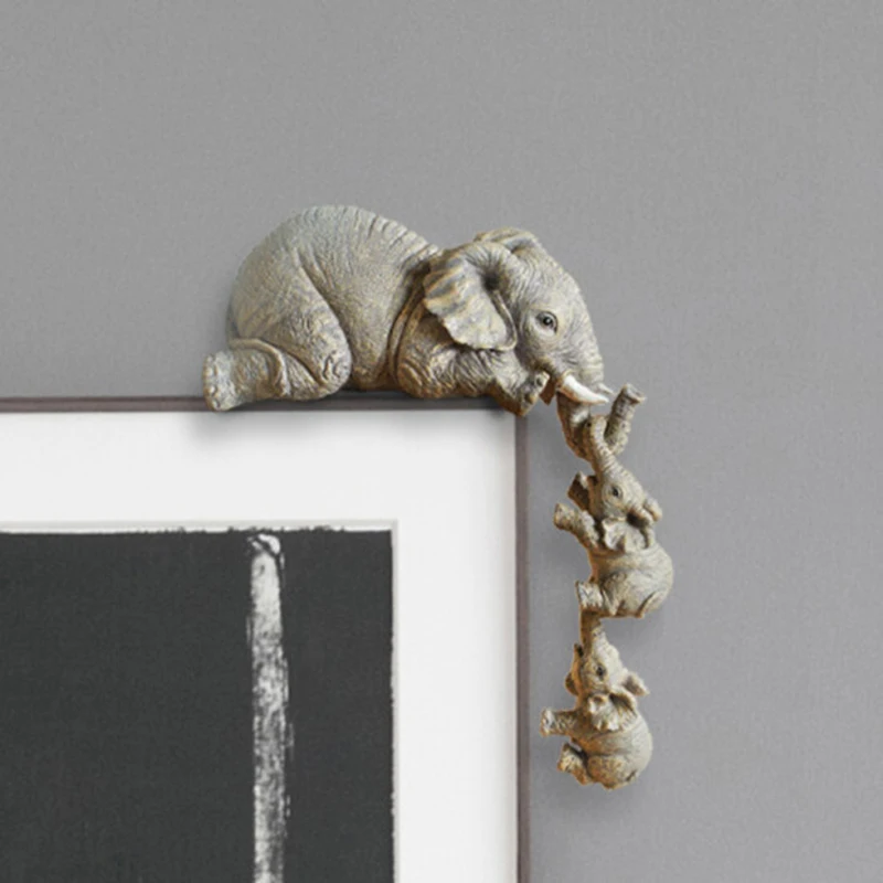 

Elephant Sitter Hand-Painted Resin Figurines 3pcs Mother and Two Babies Hanging Off The Edge of Shelf Table DFK889