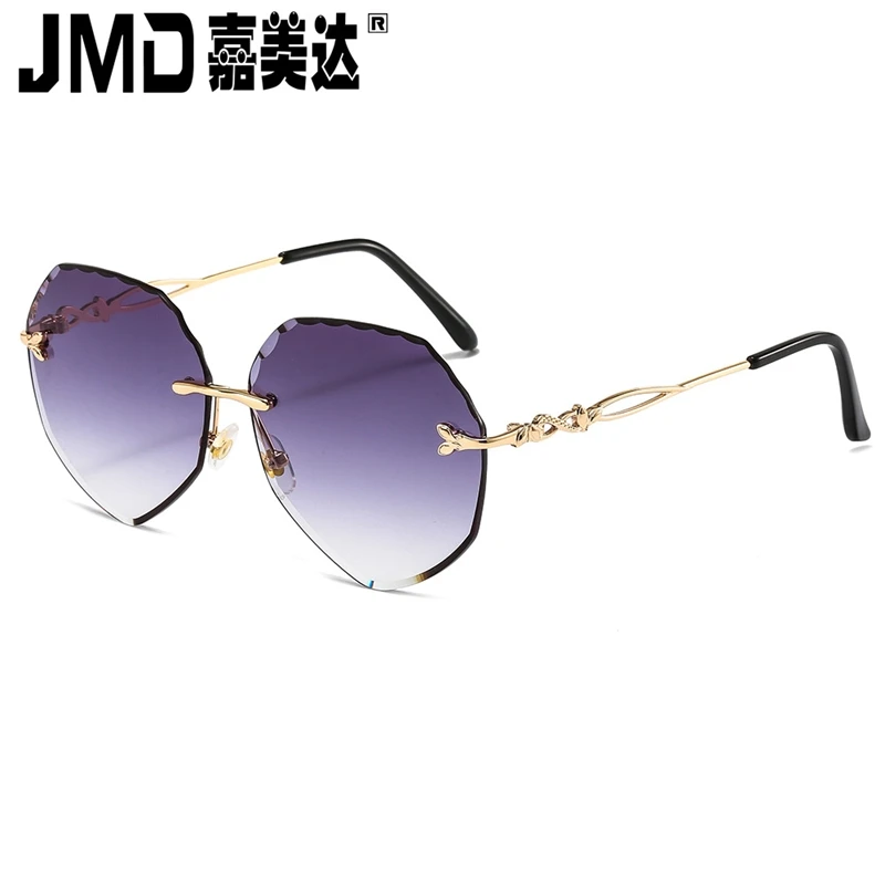 

New rimless cut edge Sunglasses Women's fashion diamond inlaid ocean piece women's S013 Sunglasses versatile Sunglasses