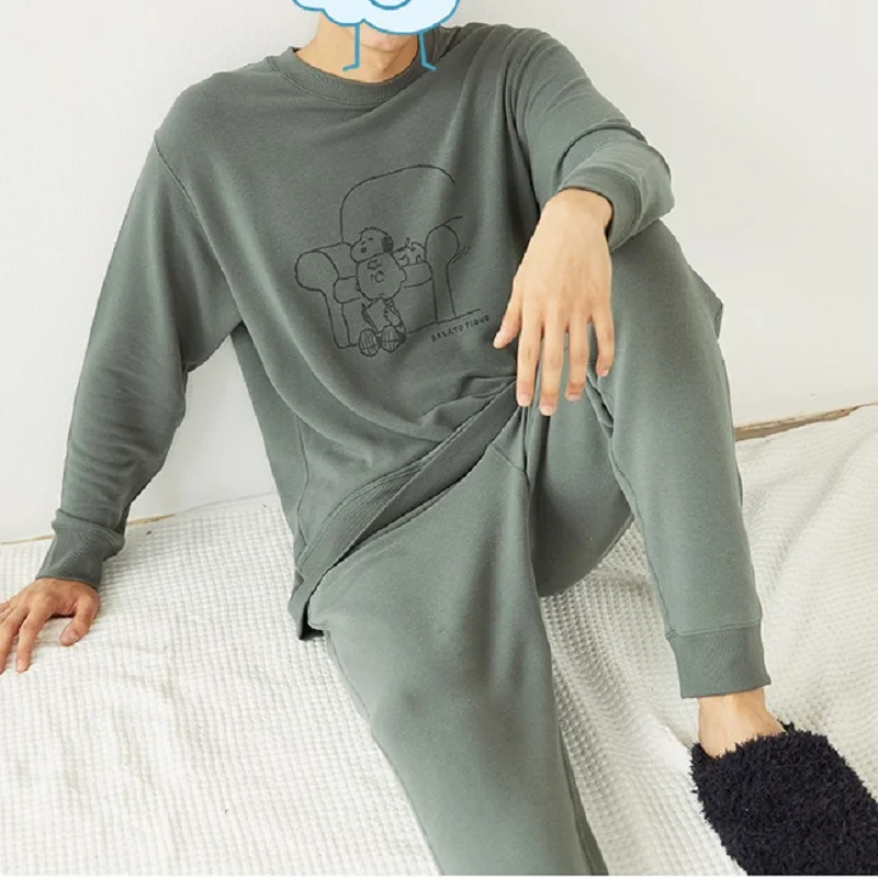 The new couple long-sleeved trousers pajama suit, comfortable and soft male long-sleeved home wear suit, round neck print.