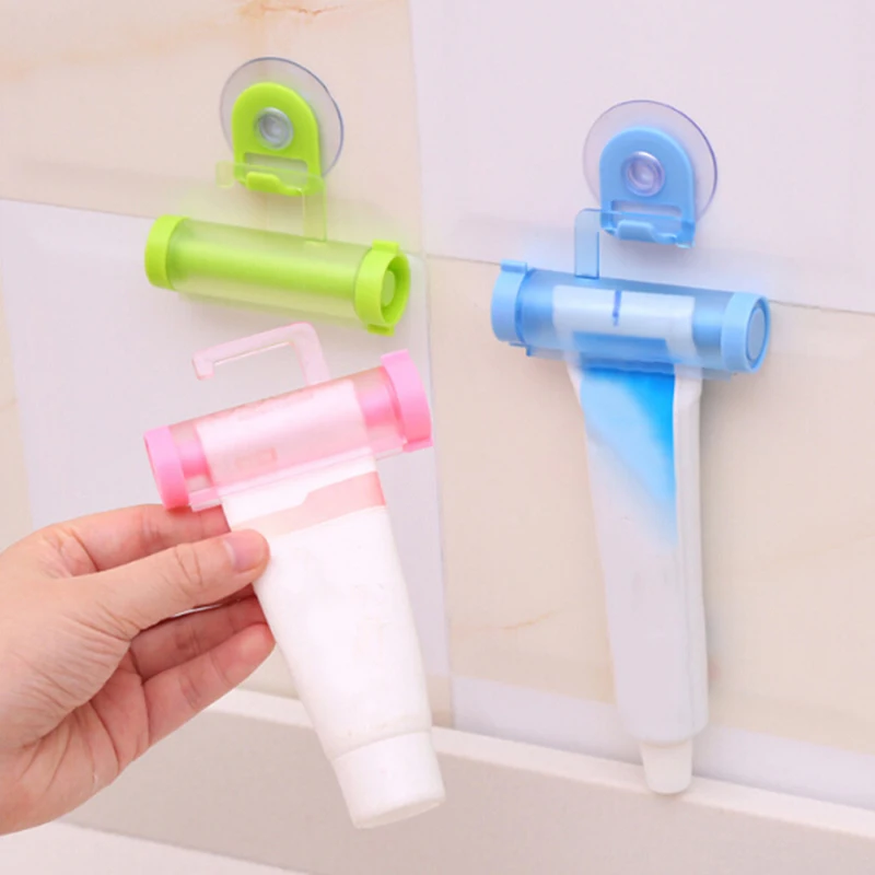 

Plastic Toothpaste Holder Bathroom Accessories Random color Rolling Tube Squeezer Useful Toothpaste Easy Dispenser Bathroom