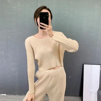 plus size crop top women 2022 spring and summer new long sleeved round neck stretch miyake pleated bottoming short t shirt