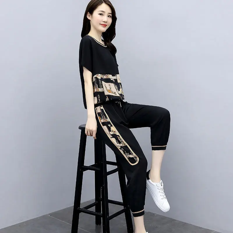 

2021 Summer New Fashion Casual Suit Female Korean Version Loose Short-Sleeved T-Shirt Top + Nine-Point Pants Two-Piece Suit