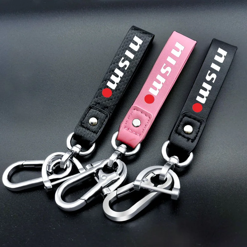 

1pcs Car Keychain Trinket Carbon Fiber Keyring For nismo Logo Emblem R34 GTR Nissans Tiida Sylphy Teana Note X-trail 1 2 Qashqa