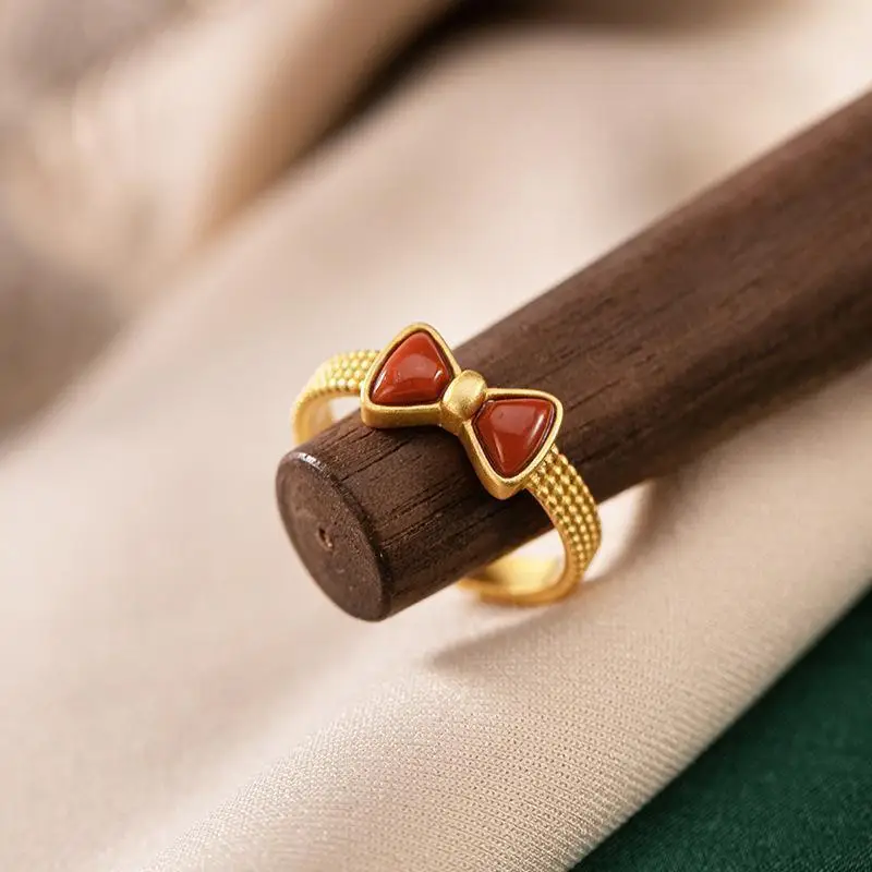 

Кольцо женское открытое из серебра пробы с красным агатом