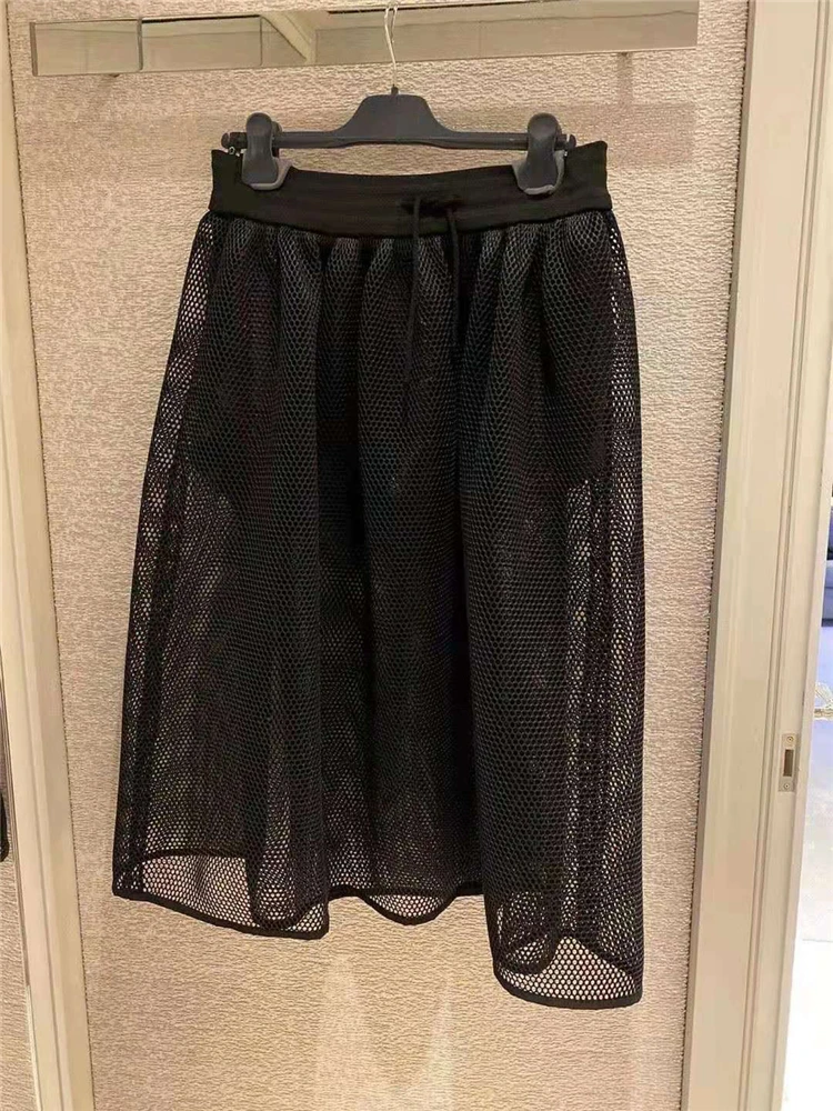 

New Mesh Transparent Hollow Skirt 2021 Women's Fashion Simple Large Hole High Waist Thin A-type Mid-lengthCulottes Elastic Waist