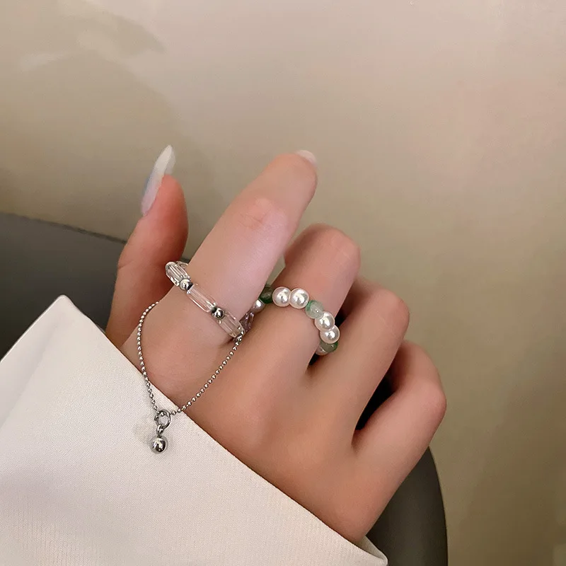 

Женский комплект колец на два пальца с кристаллами и жемчугом