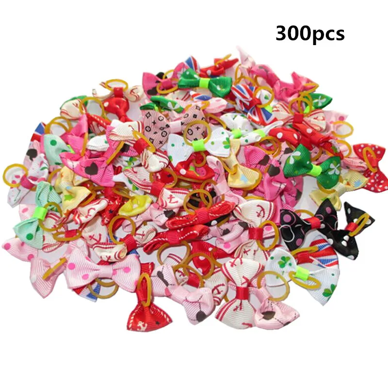 300pc 300 шт./лот ручной работы кошка собака банты для волос Тедди уход за собакой аксессуары с эластичными резиновыми лентами - Цвет: 300pc
