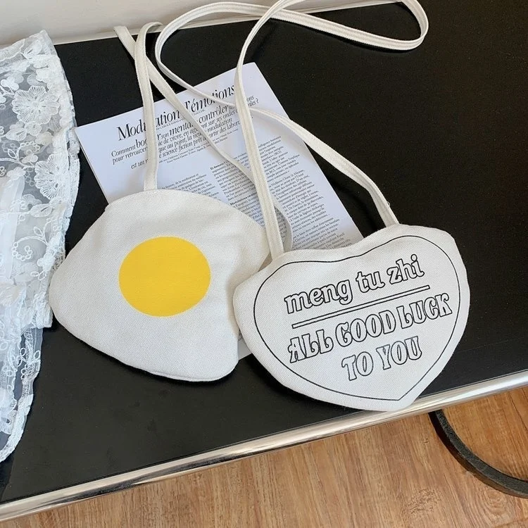 

Ins Harajuku funny personality love eggs soft girl student canvas bag Korean version shoulder bag