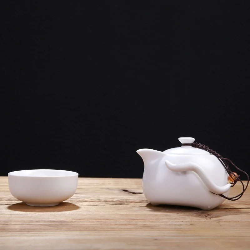 

Dehua White Porcelain Travel Tea Set Dingyao Matt Penguin Pot Kung Fu Ceramic Portable Teapot Teacup Set