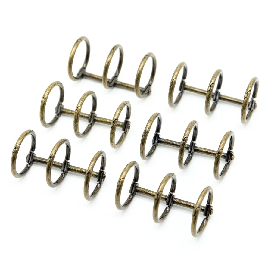 

Бронзово-золотые 3-кольцевые зажимы для переплета 6 шт.