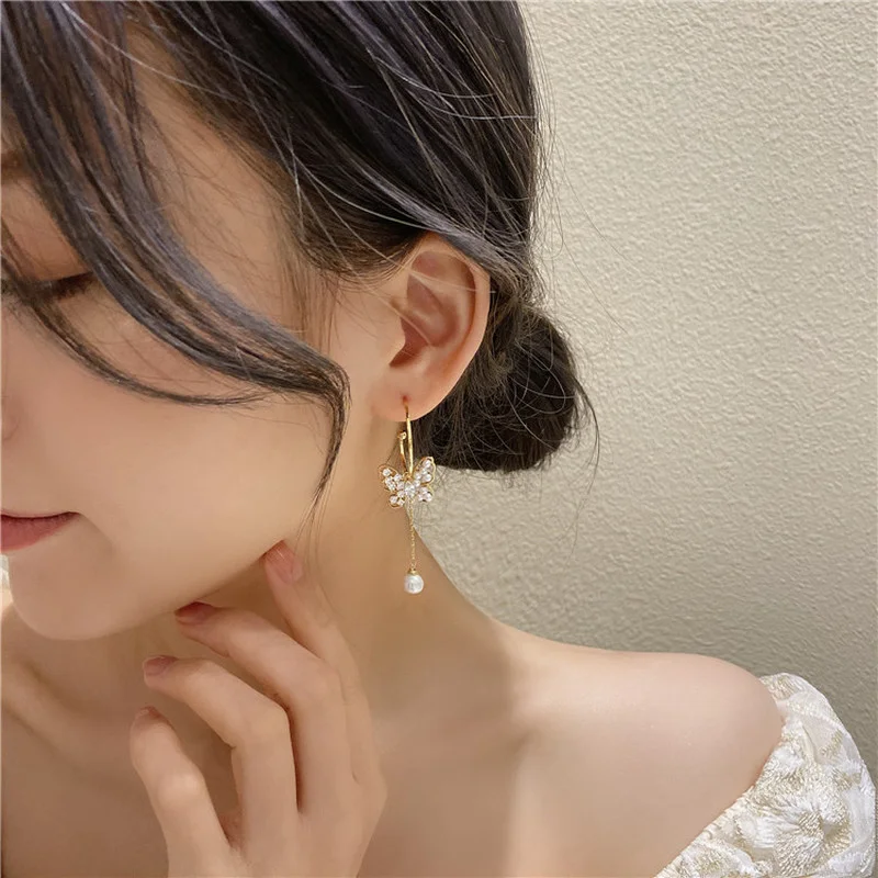 

Origin Summer Fashion Hollow Pearl Butterfly Dangle Earring for Women Stylish Rhinestone Long Tassel Earring Jewelry Pendientes