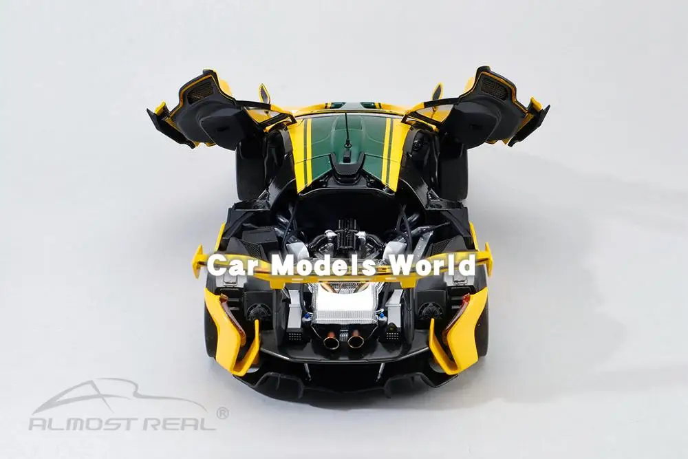 Литая под давлением модель автомобиля почти реальная P1 G T R 1:18 (желтый) + маленький
