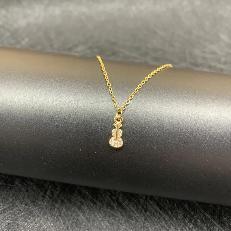 

2022 New Fashion Women Metal Cartoon Guitar Zircon Pendant Chain Necklace Women Sexy Party Musical Instrument Necklace Jewelry