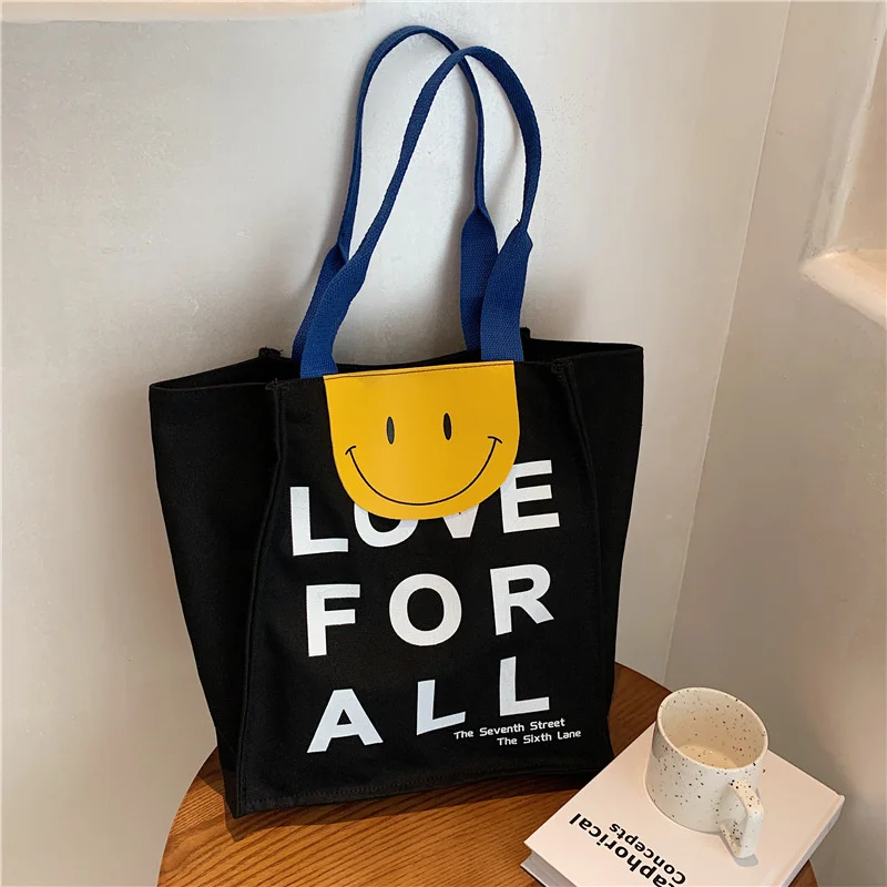 

Female Canvas Bag 2021 New Women Handbag Commuter Tote Bag Printed Smiling Face Large Capacity Bag Simple Single Shoulder Bags