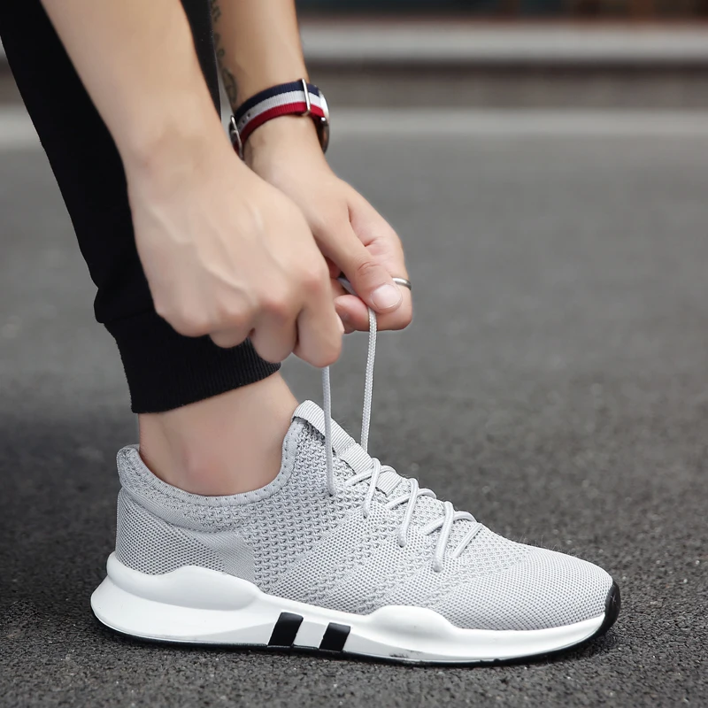 

Men Breathable Flying Sneakers Lightweight Non-Slip Mesh Running Shoes Student Casual Travel Shoes Zapatillas De Hombre