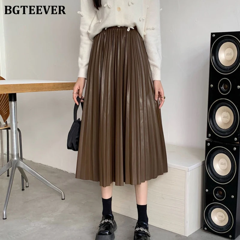 

BGTEEVER Elegant Elastic Waist Women PU Leather Skirts 2021 Autumn Winter Loose Mid-length Female Pleated Skirts