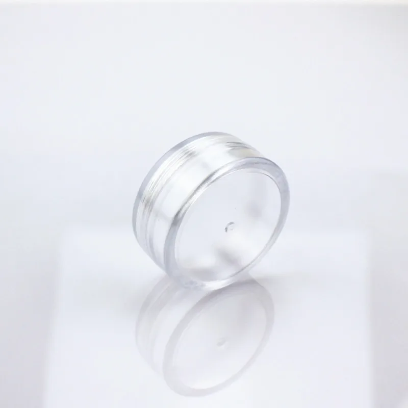 

Wholesale 500pcs/lot 20g Plastic Jar Cosmetic Packaging Bottle Make Up Sample Jar Display Container with Black Cap