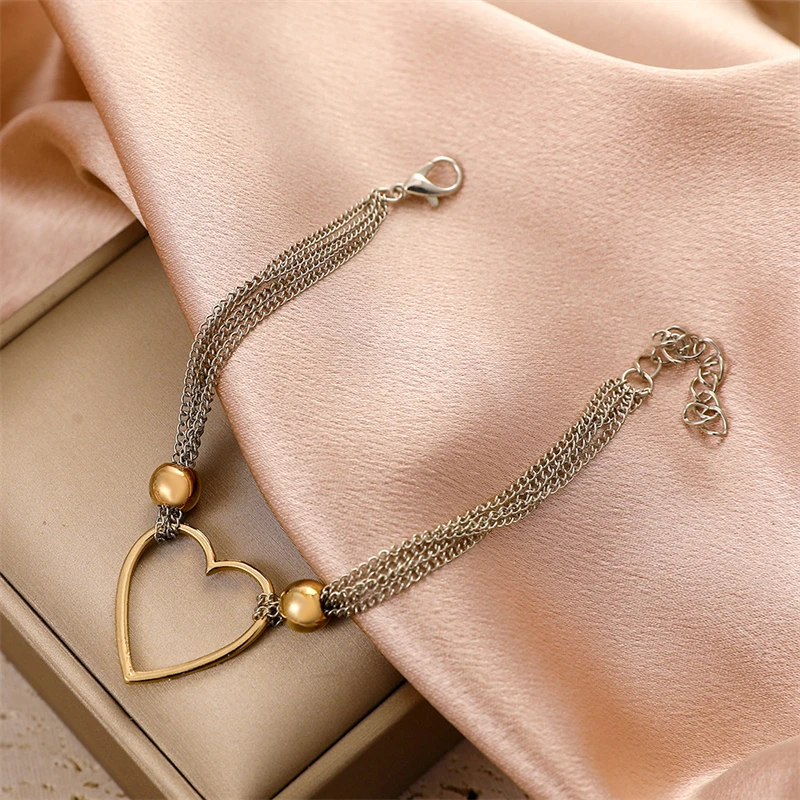 

Exquisite And Simple Geometric Design Hollow Love Pendant Bracelet Creative multi-Layered Wearing Bracelet Jewelry Female