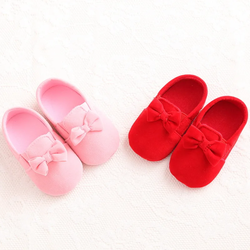 

Spring and autumn solid color cotton female baby princess shoes soft bottom shoes non-slip bow set head baby toddler shoes